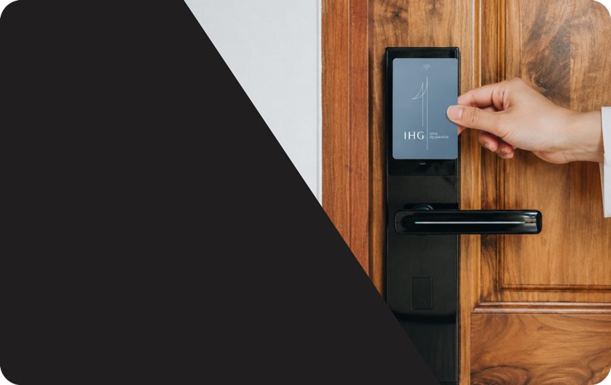 PVC hotel key card being used on an electronic door lock